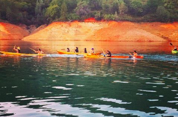 Participants in the Winnemem Wintu’s Run4Salmon paddle on Lake Shasta. (Winnemem Wintu)
