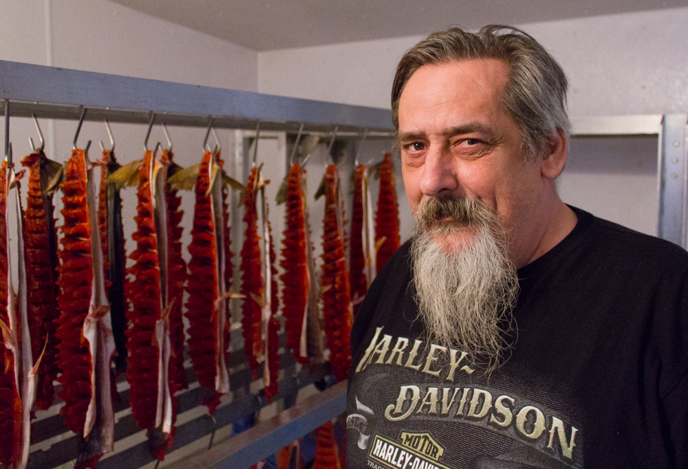 Joe Hess is the manager of Nunavut Country Food in Iqaluit. Hess sells a variety of country food, including dried Arctic char, or pitsi, which he says is very popular. (Alexander Kim)