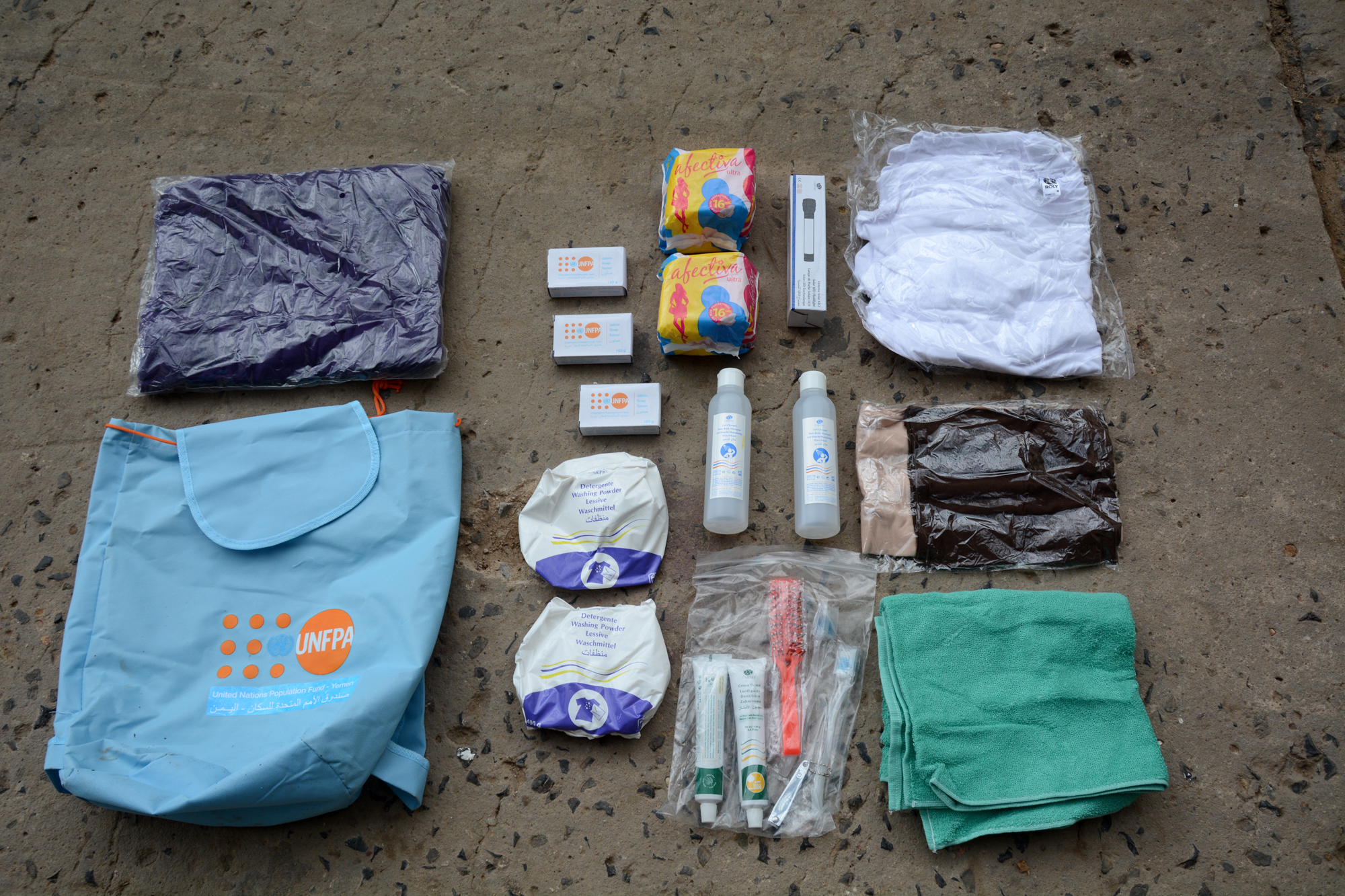 Dignity kits, which include personal hygiene items and culturally appropriate clothing, help women and girls stay healthy and avoid gender-based violence as they seek humanitarian aid. (UNFPA)