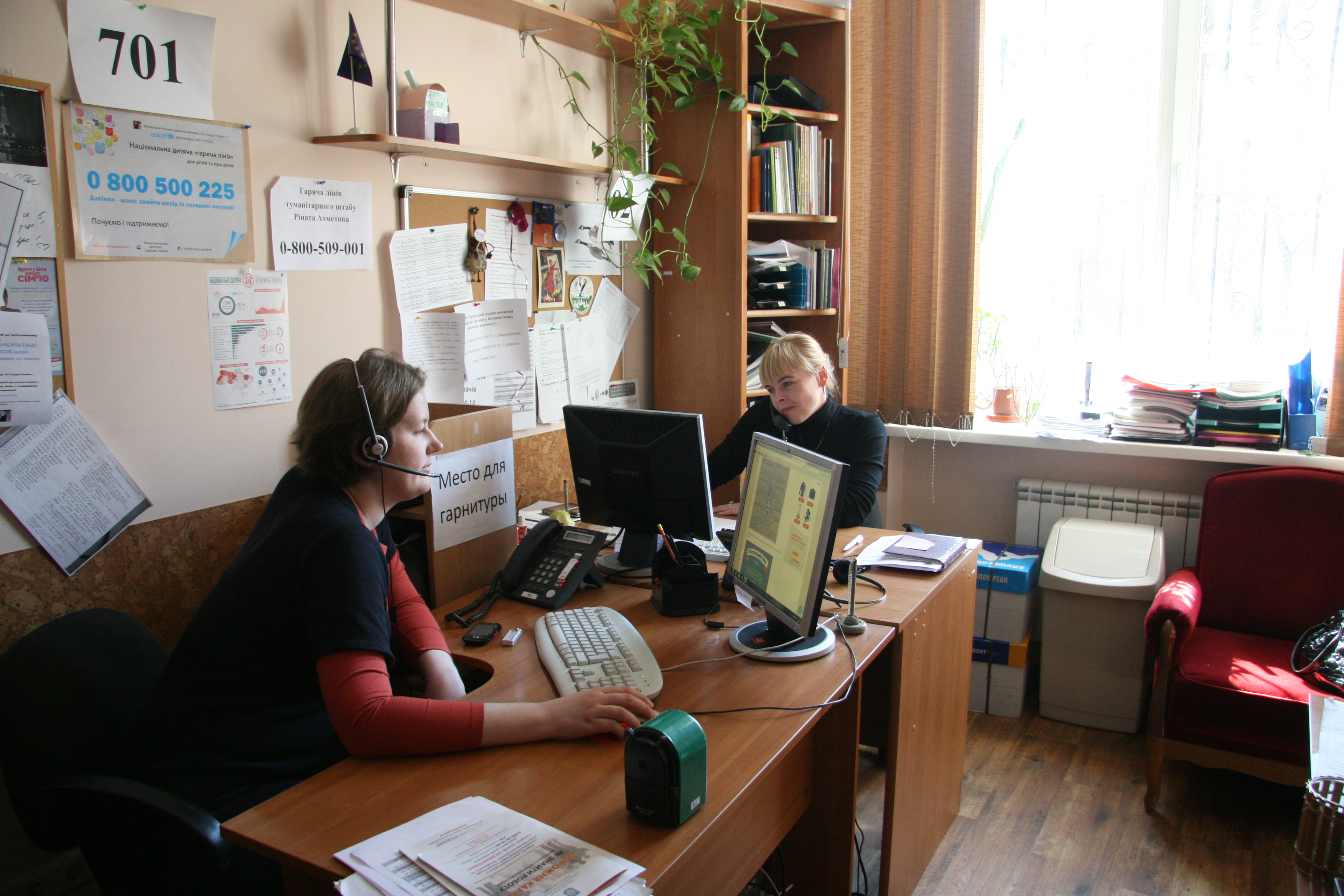 Women at the La Strada offices answer calls to Ukraine's only hotline for abuse victims. (Courtesy of La Strada Ukraine)